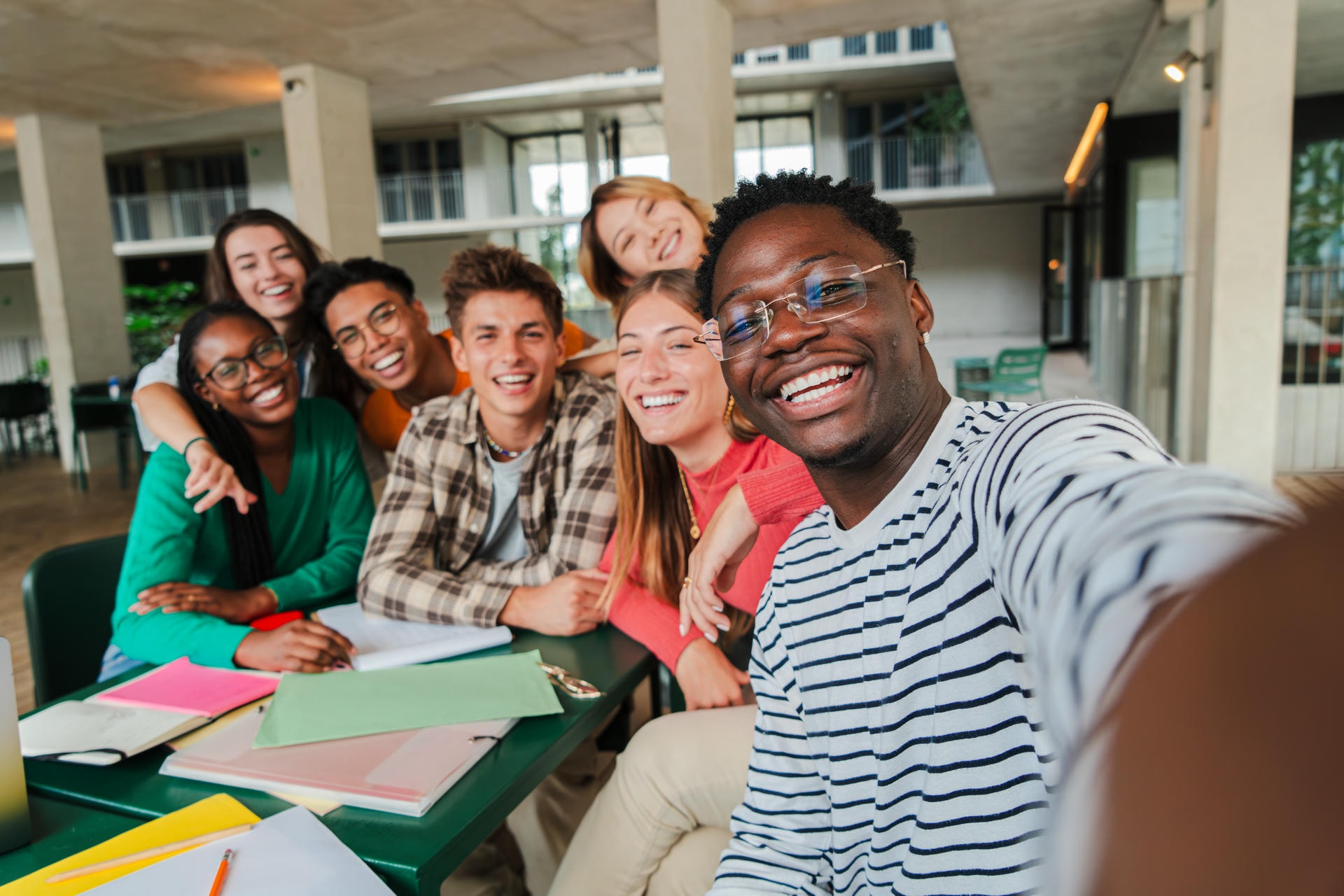 happy-young-students-taking-a-selfie-portrait-toge-2026-03-24-12-58-17-utc